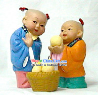 Beijing Hand Made Clay Statue-Kids Giving The Bigger Pear to Others